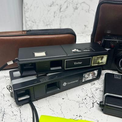 Vintage point & shoot cameras & cases