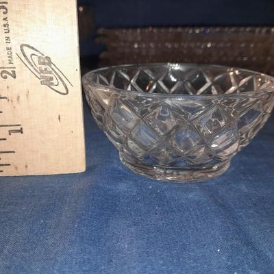 Glass snack plates with stemware and a bowl