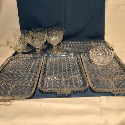 Glass snack plates with stemware and a bowl