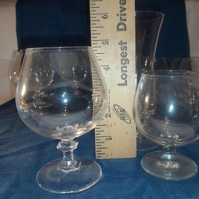 Assortment of stemmed drinking glasses