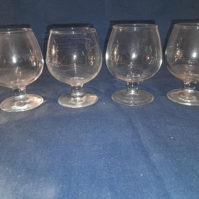 Assortment of stemmed drinking glasses
