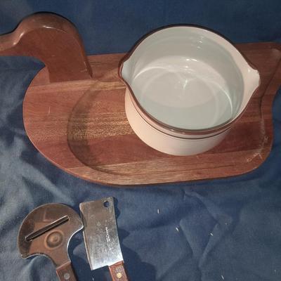 Duck charcuterie board with utensils