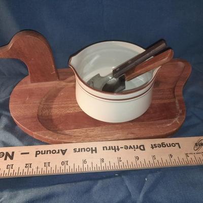 Duck charcuterie board with utensils