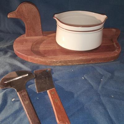 Duck charcuterie board with utensils