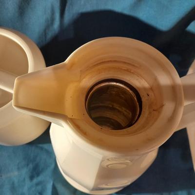 Tupperware juice pitcher and insulated water pitcher