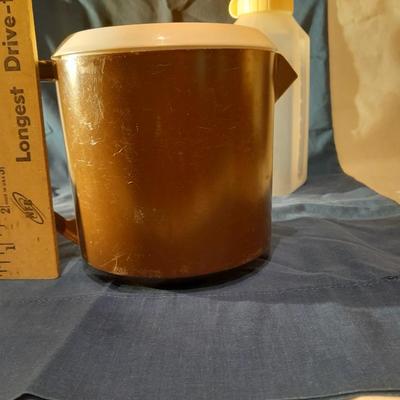 Plastic pitchers, Tupperware and Rubbermaid with Brumate travel mug