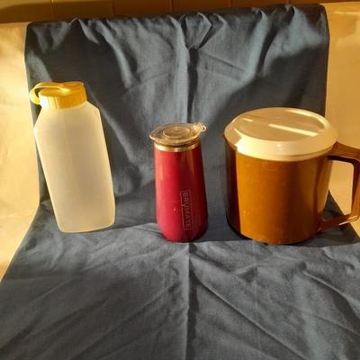 Plastic pitchers, Tupperware and Rubbermaid with Brumate travel mug