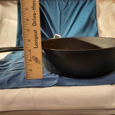 Unmarked Cast Iron skillet with lid