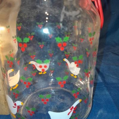 Three glass canisters with lids