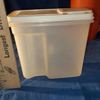 Vintage Tupperware pitcher and cake keeper with a Rubbermaid food storage container