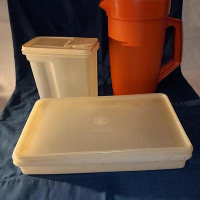 Vintage Tupperware pitcher and cake keeper with a Rubbermaid food storage container
