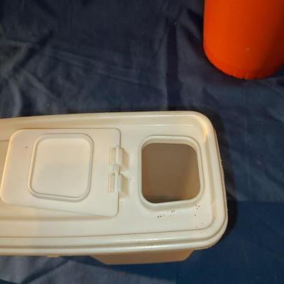Vintage Tupperware pitcher and cake keeper with a Rubbermaid food storage container