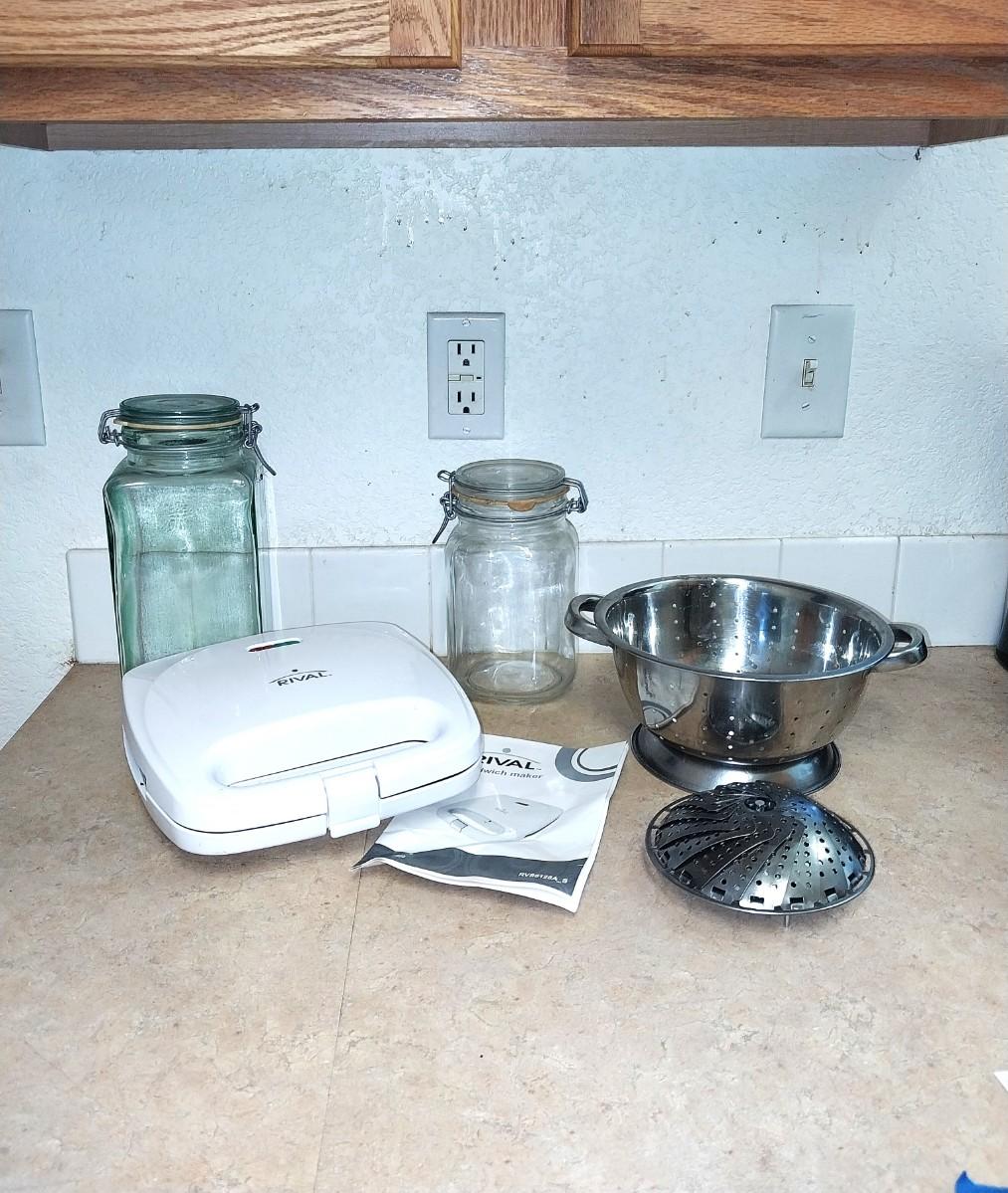 RIVAL SANDWICH MAKERSTAINLESS STEEL STRAINER AND GLASS CONTAINERS
