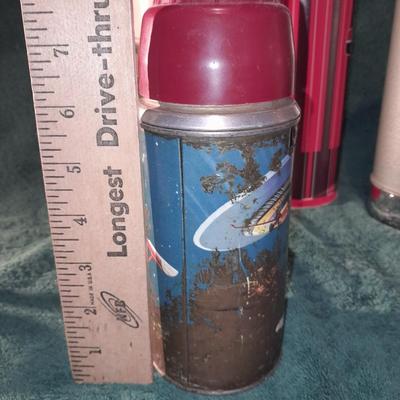 Vintage thermoses and wine corks