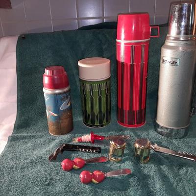 Vintage thermoses and wine corks