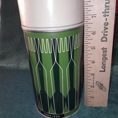 Vintage thermoses and wine corks