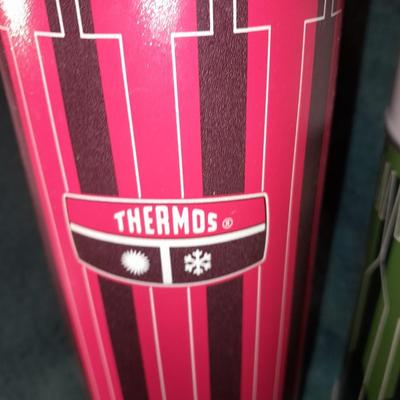 Vintage thermoses and wine corks