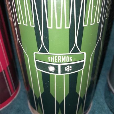 Vintage thermoses and wine corks