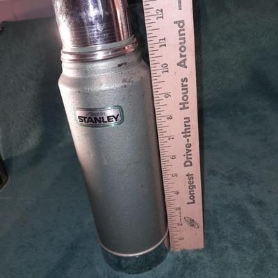 Vintage thermoses and wine corks