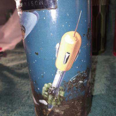 Vintage thermoses and wine corks