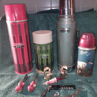 Vintage thermoses and wine corks