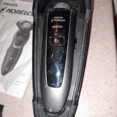 Electric razors with chargers and shaving cleaner