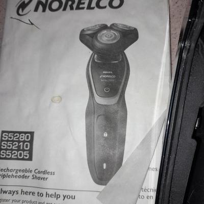 Electric razors with chargers and shaving cleaner