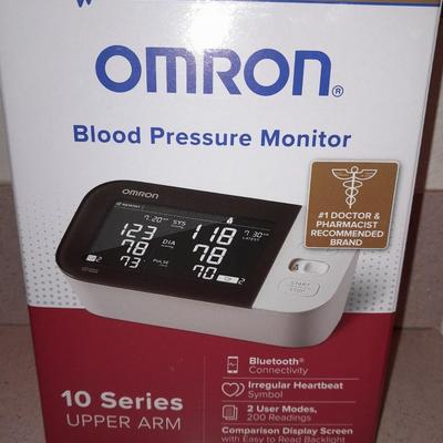 Omron Blood pressure monitor with instructions