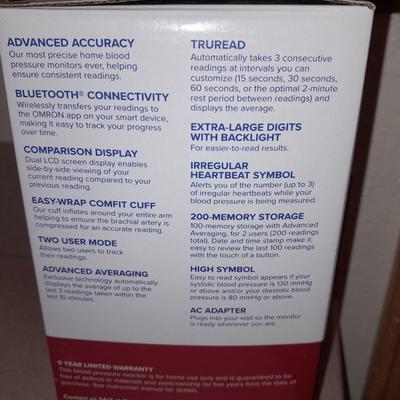 Omron Blood pressure monitor with instructions