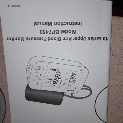 Omron Blood pressure monitor with instructions