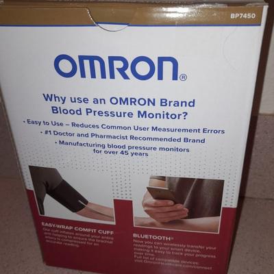Omron Blood pressure monitor with instructions