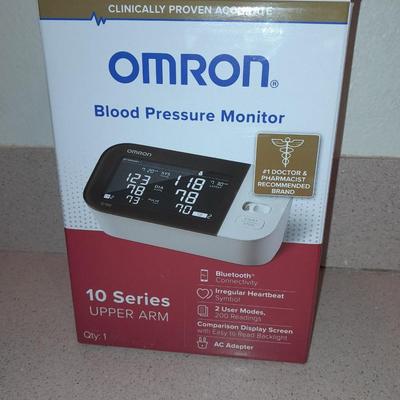 Omron Blood pressure monitor with instructions