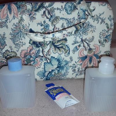 Travel bag / makeup bag full of traveling items for hygiene - Brook stone travel blow dryer