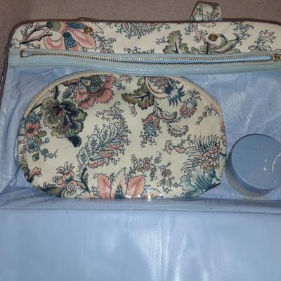 Travel bag / makeup bag full of traveling items for hygiene - Brook stone travel blow dryer
