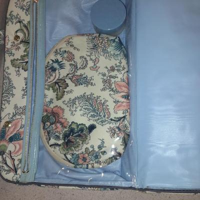 Travel bag / makeup bag full of traveling items for hygiene - Brook stone travel blow dryer