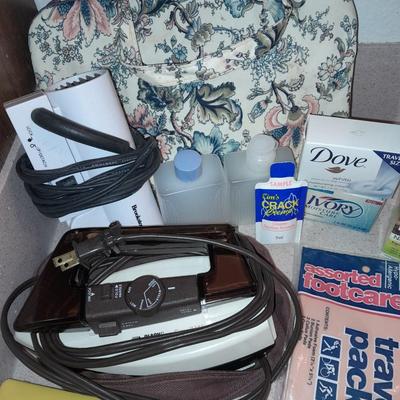 Travel bag / makeup bag full of traveling items for hygiene - Brook stone travel blow dryer