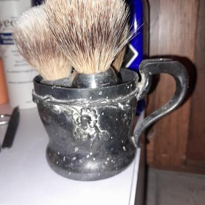 Men's hygiene items shaving brushes, lotions, cologne and more