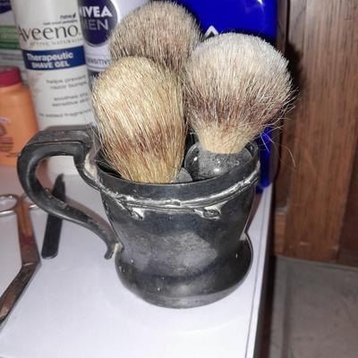 Men's hygiene items shaving brushes, lotions, cologne and more