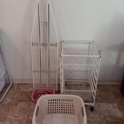 Metal Ironing board with metal baskets on stand and a clothing Iron