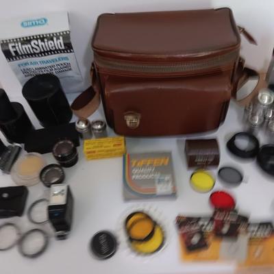 Camera accessories and a Vintage Perrin Contour Leather Camera Bag top grain cowhide