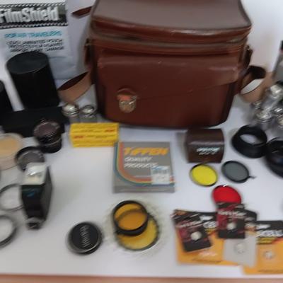 Camera accessories and a Vintage Perrin Contour Leather Camera Bag top grain cowhide