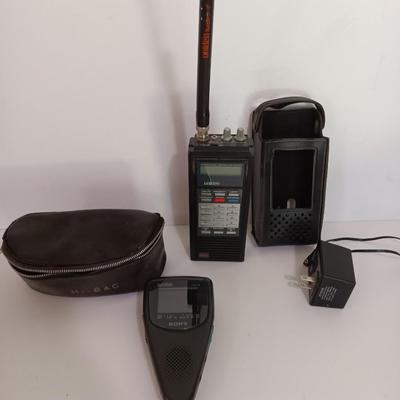 Working Uniden 10 channel Scanner radio with power cord with a Sony handheld watchman television
