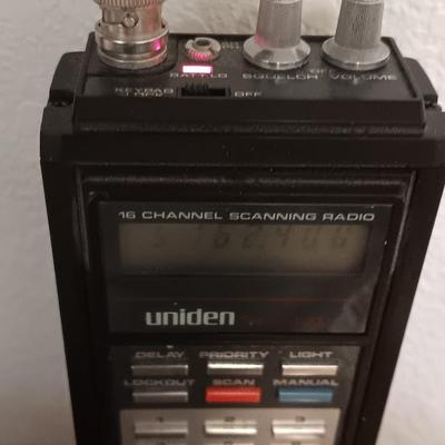 Working Uniden 10 channel Scanner radio with power cord with a Sony handheld watchman television
