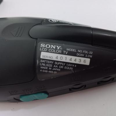 Working Uniden 10 channel Scanner radio with power cord with a Sony handheld watchman television