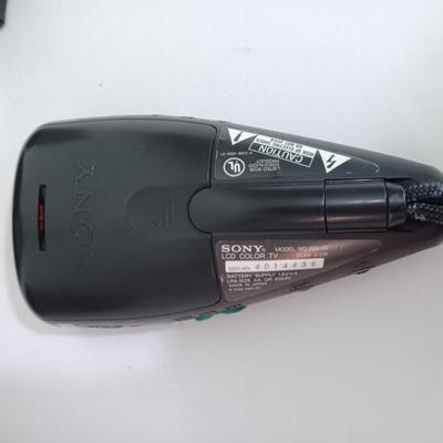 Working Uniden 10 channel Scanner radio with power cord with a Sony handheld watchman television