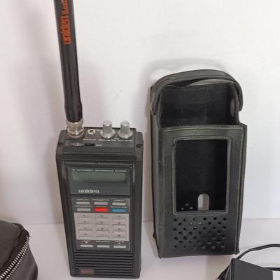 Working Uniden 10 channel Scanner radio with power cord with a Sony handheld watchman television