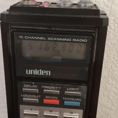 Working Uniden 10 channel Scanner radio with power cord with a Sony handheld watchman television