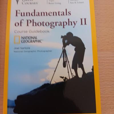 National Geographic books - Hubble cosmos- The brain - Birds - and Photography lessons on disc