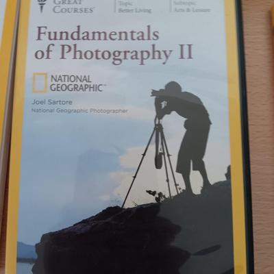 National Geographic books - Hubble cosmos- The brain - Birds - and Photography lessons on disc