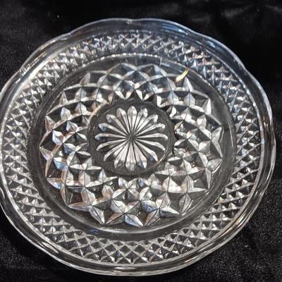Three beautiful glass dishes Large bowl, oval scalloped dish, and small plate